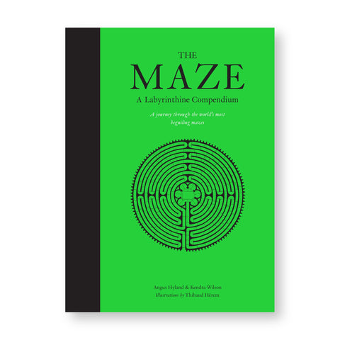 Vivid green book cover with a black spine; cover features a line drawing of a circular maze below serif title text.
