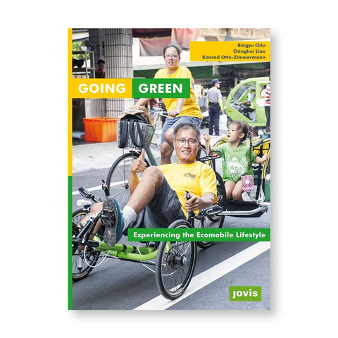 Book cover with photograph of three family members one on a bicycle one on three-wheeled peddled vehicle towing their child on a busy street scene. Title in white letters in yellow and green fields