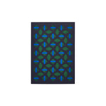 Navy greeting card with geometric cutouts: rows of alternating diamond shapes with stripes down the center, in dark green and blue.