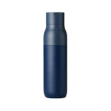 A photo of the LARQ Bottle in Monaco Blue. The back of the bottle faces the viewer exposing the camouflaged usb port built into side of the bottle cap.