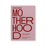 Pink textile book cover with large red title text, the word "MOTHERHOOD" broken up into multiple lines with o's of differing widths