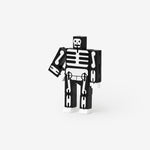Articulated wooden robot toy, painted black with white skeleton bones.