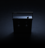 Black electronic device on a dark colored background