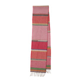 Red woven scarf with colorful patterns on a white background
