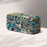 Colorful rectangular speaker with a pattern on a white background