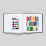 Interior book spread featuring a vintage Subway Guide with the different colored circle emblems for each subway line.