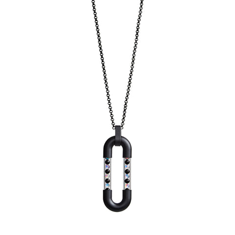 Black minimalistic ring chain with an oval centerpiece assembled form four parts: two black matt metal U-shaped elements interconnected with two clear tubes filled with onyx and reflective glass spheres.  