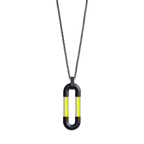 Black minimalistic ring chain with an oval centerpiece assembled form four parts: two black matt metal U-shaped elements interconnected with two thin lines of pure yellow pigment set in thick quartz tubes.