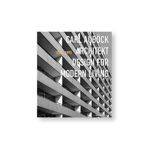 Book cover with photograph of a gray modernist building and title overlaid in white sans serif letters
