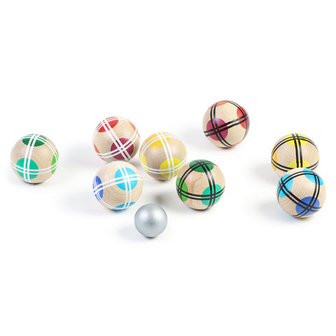 Image features rainbow assorted bocce set, spread out across surface