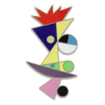 A brooch with a colorful combination of geometrical shapes that form an abstract portrait. 