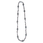 Long necklace designed from iridescent thread interwoven with small glass beads.