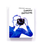 White book cover with deep blue watercolor sketch of a figure holding a camera rendered in photographic detail