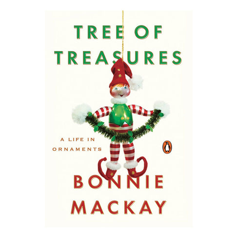Cream colored book cover with a playful elf Christmas ornament hanging in the center with title information in green letters above and author in red letters below