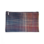 Zip pouch in primarily navy plaid pattern, woven with fourteen different colors for random look. 