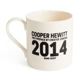 An off-white mug in Cooper Hewitt typeface reads "Cooper Hewitt, The Typeface of Chester Jenkins, 2014, Sans-Serif" 