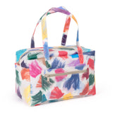 Translucent duffle bag with multi-colored silk tassel detail