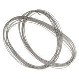 This long minimalistic necklace is assembled from ten stainless steel springs. It can be wrapped twice around the neck. 