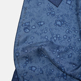Detail of the rain splatters on the silky Made by Rain Scarf.