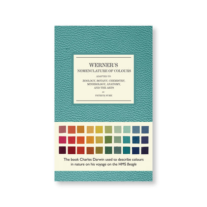 Greenish blue textured book cover with title information in a white field with black serif letters. cream colored belly band near bottom with colorful square swatches and descriptive text in modern black font