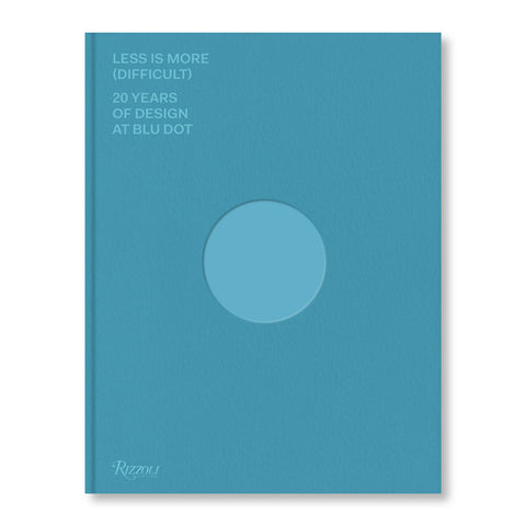 Blue book cover with cutout circle in the center and title in light blue all caps sans serif letters in upper left