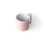 Porcelain mug featuring a modern grid textile-inspired graphic, matte exterior with gloss interior. 