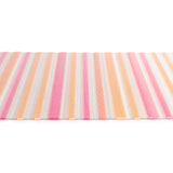 Horizontal placemat mat against a white background,  white woven mesh with alternating insert strips of bright pink and melon  acrylic strips.