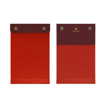 Front and back view of the palm-sized refillable notepad with snap closure in red with maroon border. The brand name and logo are embossed at center back in gold.