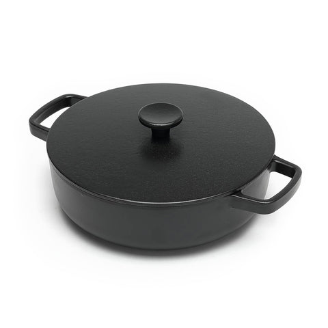 Deep dish cast iron saute pan with lid.