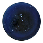Dark blue colored large platter with white rain drop detailing across its surface.
