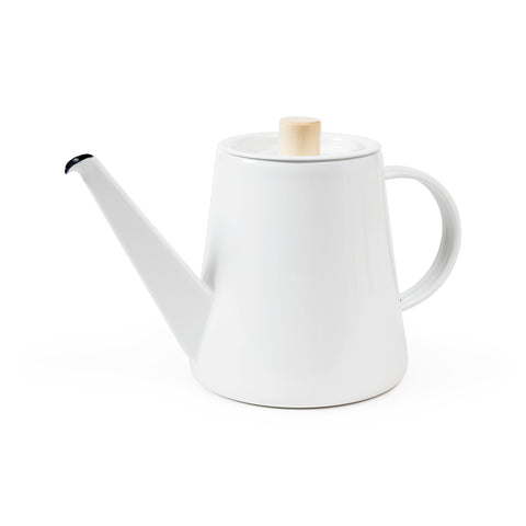 Profile view of a left facing, minimalist Kaico Drip Kettle in bright white enamel on a white background, with a tall conical body, elongated angled pour spout, “D” shaped side-handle, and slightly indented round top with light, wooden cylindrical knob.