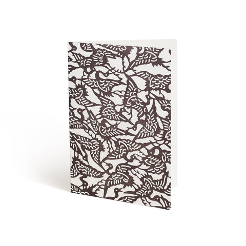 Printed in brown ink against a white background, the front of a card is covered in a repeating bird pattern that bleeds off the edges.