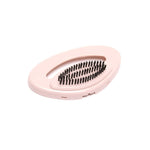 A pale pink flat head brush is a detachable part included in the Cirrus Steamer kit.