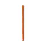 An orange straw lays vertically on a white surface.
