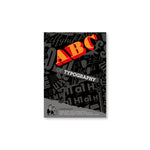 Black book cover with "ABC" large in orange and "Of Typography" below, and gray letters in various typefaces strewn across the cover.