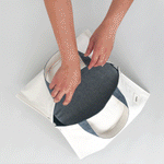 A GIF flashing images of a Plat Bowl Cover being taken out of its canvas holder.