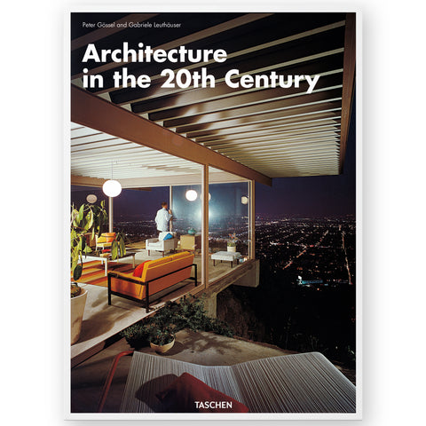 Book cover featuring a partial view of a well lit interior to a modern glass house, located on the edge of a cliff, overlooking the night sky and lights of a city in the distance. 