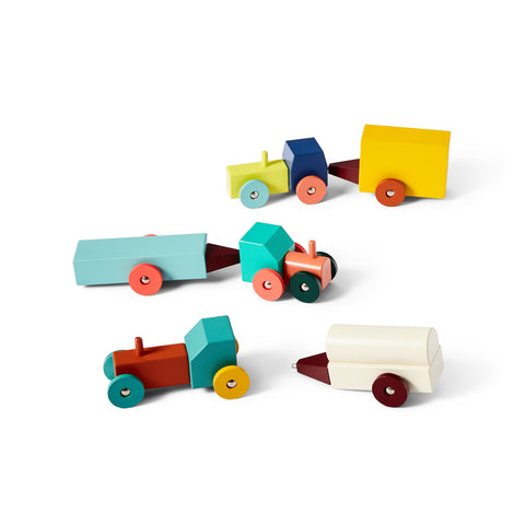 Three colorblocked tractors made up of minimal geometric forms that come apart.