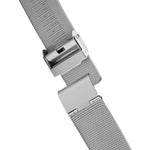 A silver clasp at the ends of a mesh watch band.