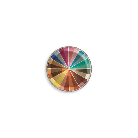 Round hemp paper textured button  featuring a color wheel with tiny color names in french around the outer edge.