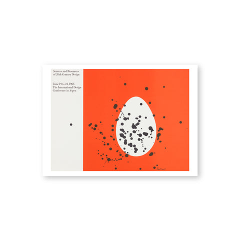 A horizontal postcard with a white border features a graphic design of a white egg within a red square with random black splatters and an off-white side panel with title and exhibition information. 