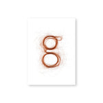 A white postcard with a vertical image of a stylized, lower case cursive “g” made  from auburn fibers.