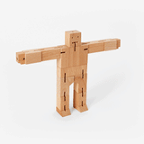 Gif of natural colored Micro Cubebot changing form, from cube to standing position. 