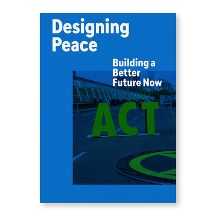 Textured blue book cover featuring a photograph of large 3D letters spelling “ACT” on a street, in front of a group of protestors holding signs. White title text overlaid reads “Designing Peace” “Building a Better Future Now.”