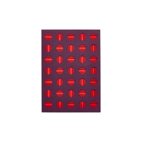 Purple red greeting card with geometric cutouts: rows of circles with a stripe down each center in maroon and red.