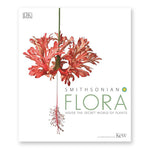 White book cover with a hanging flower with coral pink petals and stamens further hanging down to the left of the title in mint green letters