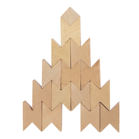 14 Beech wood blocks with cut-outs at the end allowing the blocks to nest together. The blocks are stacked into a tower with a single cube block on top.