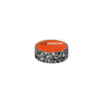 Image of a single role of tape with a black and white marbleized pattern. The Penco logo is printed on a bright orange round sticker that covers the center opening of the roll.