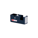 A dark blue rectangular shaped dispenser with two slots cut out for a tape roll. The textured steel spool is visible inside the smaller slot. A steel plaque on the front panel has a serrated edge. A red and white retro styled Penco logo is on the side panel.