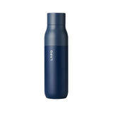 A powder-coated steel water bottle in navy blue. The bottle features a flat round cap. The name of the company is vertically printed upward and in silver.